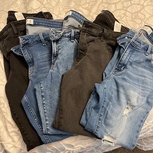 Five pairs of Abercrombie & Finch super skinny ankle jeans sizes 14 & 12.